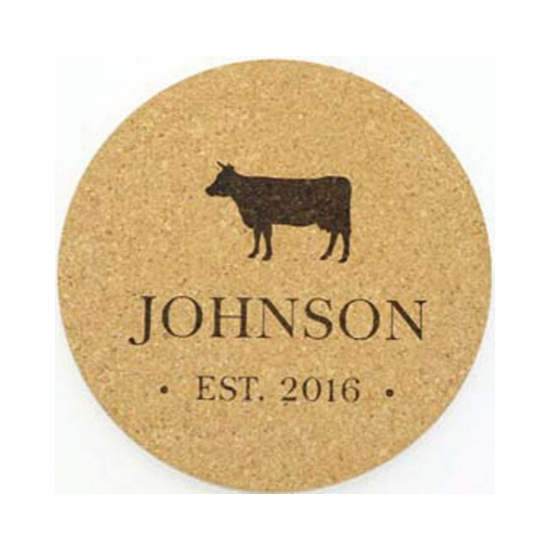 Farmhouse kitchen decor customized cork trivet with last name and a cow silhouette.