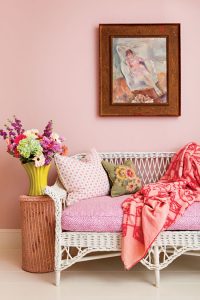 paint color ideas for a pink room wicker settee, vintage painting and flowers
