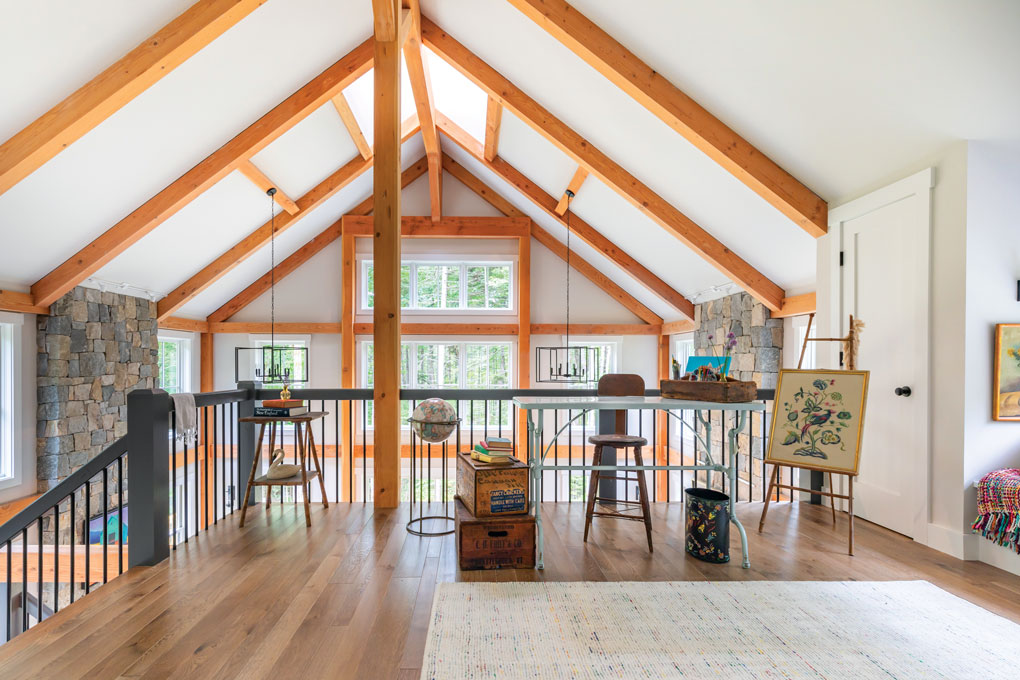 Vaulted ceiling loft space with art area and loads of bright window light. 