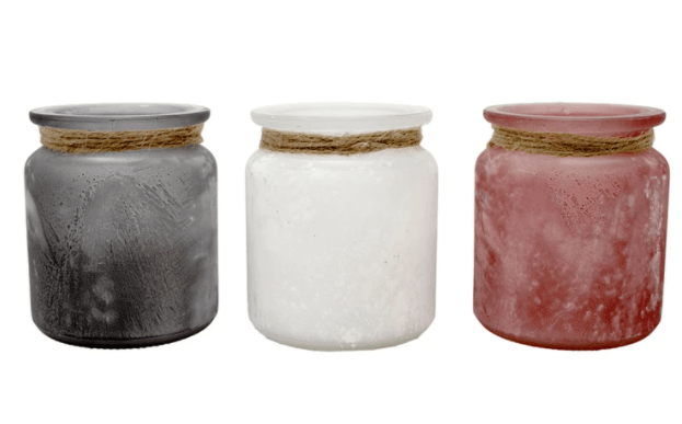 Set of three candles in gray, white and red
