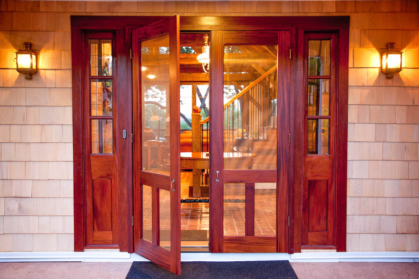 Double wood front door with copper screen