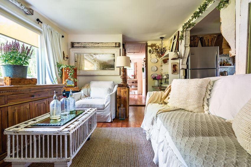 Living room of a cozy country cottage in neutral colors
