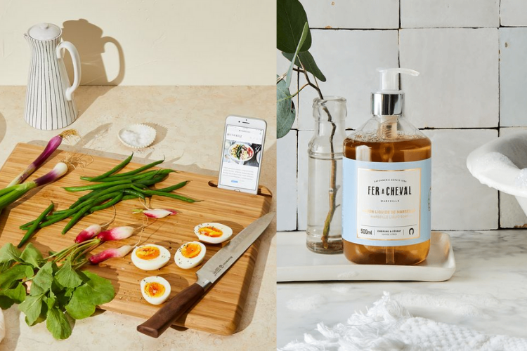 cutting board and soap next to sink