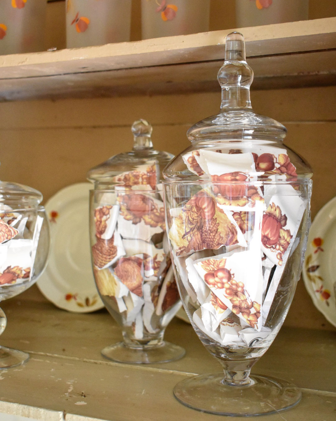 Apothecary jars full of broken plate shards