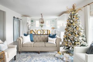 Neutral and blue living room decorated for christmas
