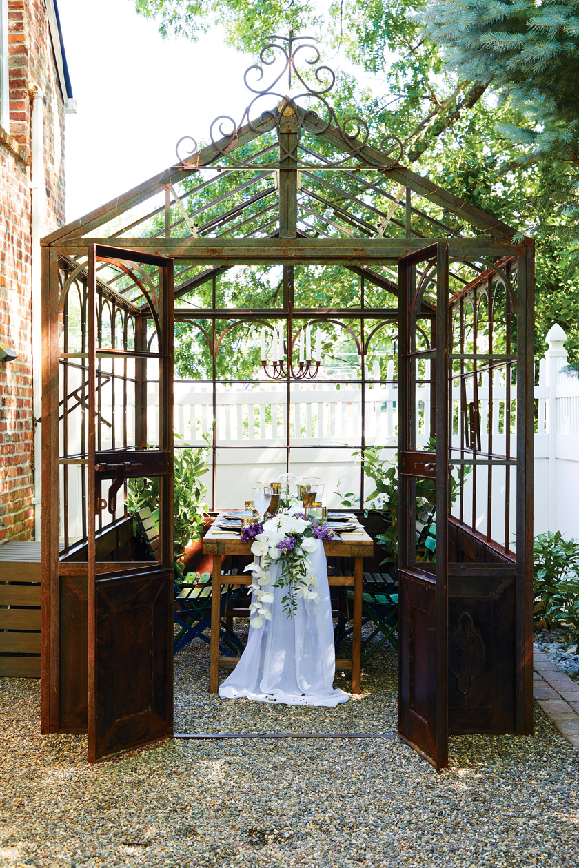 This was a giant iron structure that we found. It’s an old greenhouse, and we use it to create kind of an enchanted dining area,