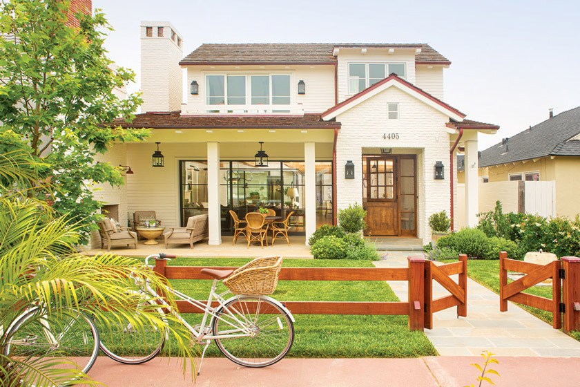 European farmhouse-styled beach cottage is warm and welcoming from the first glance.