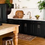 You can’t go wrong with a traditional black-and-white pairing. This kitchen takes on a modern edge but maintains its charm.