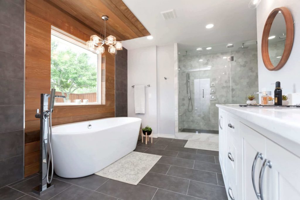 Bathroom with a gorgeous shower, tub, and vanity