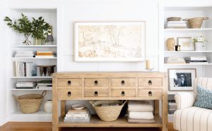 A tidy table in a living room setting.