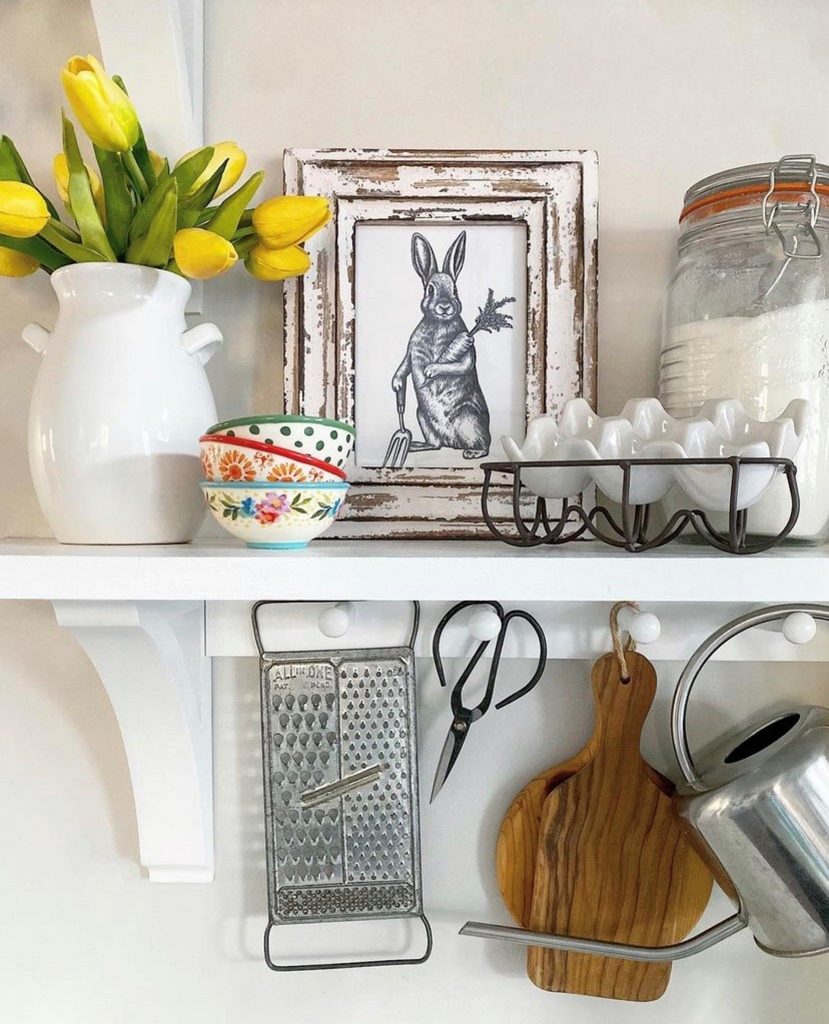 A mix of thrifted and new items adorns Jen’s white kitchen shelves.