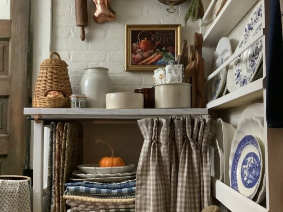 country cottage pantry with vintage baskets and storage