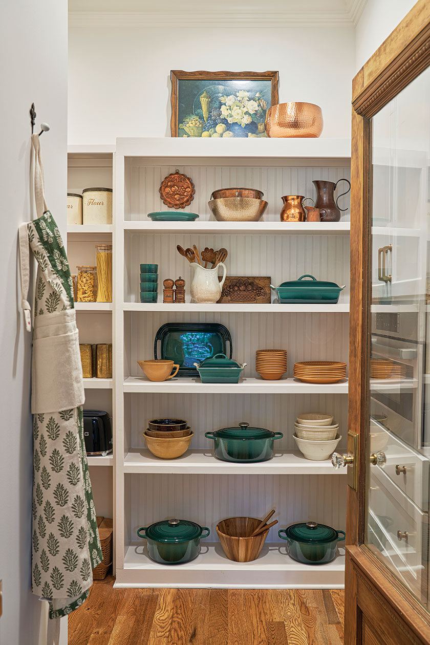 butler's pantry with white shelves