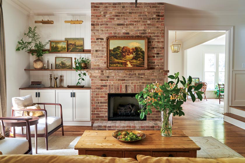 brick fireplace in renovated farmhouse cottage