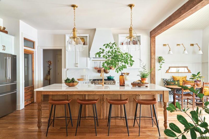 kitchen with oak and white color scheme and built-in dining area