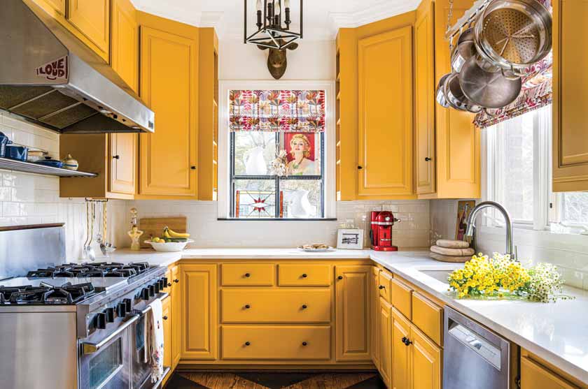 goldenrod yellow cabinetry in colorful historic Nashville home