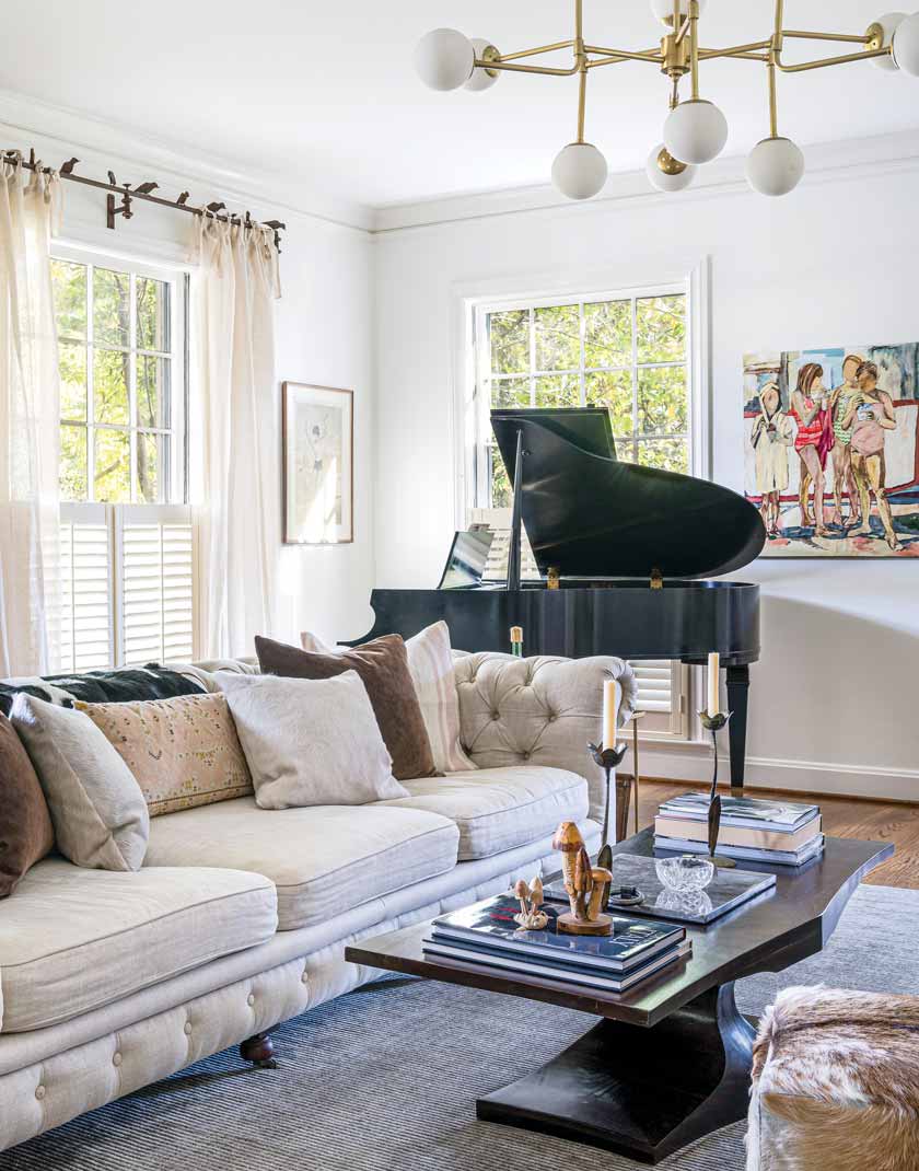 grand piano and contemporary art in historic home