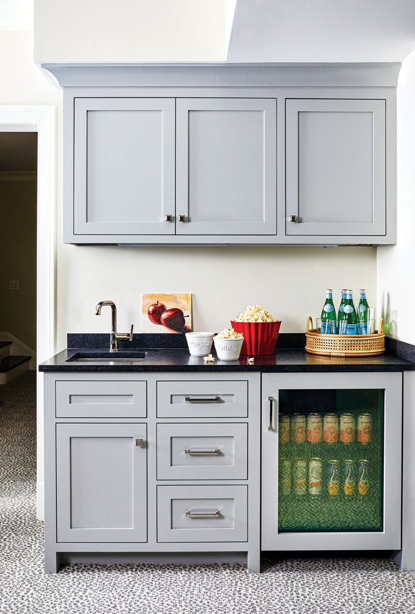 gray cabinetry and beverage fridge