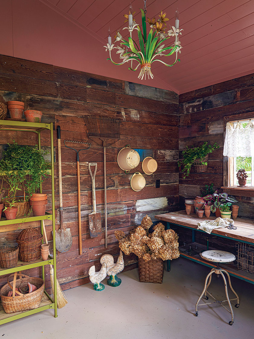 potting shed with floral themed chandelier
