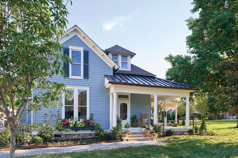 exterior of renovated Franklin home with blue siding and white trim