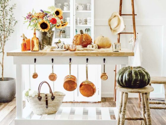 farmers market fall kitchen with pumpkins and sunflower bouquet