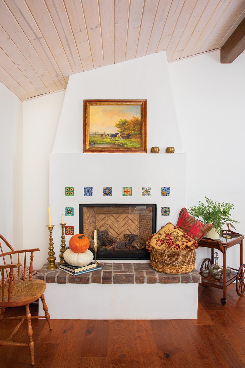 fireplace with mosaic tile along fireplace surround in maximum style cottage