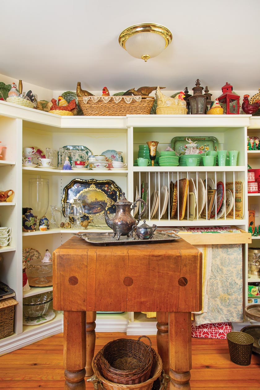 kitchen collectibles chicken storage jars, jadeite and antique tea set in California home