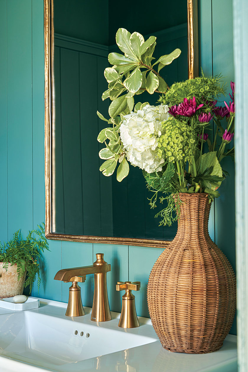 teal bathroom in renovated farmhouse cottage