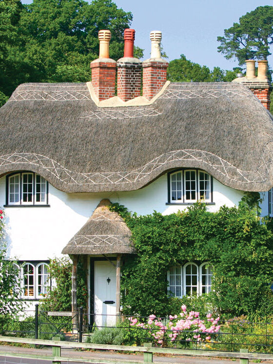 English cottage with traditional thatched roof