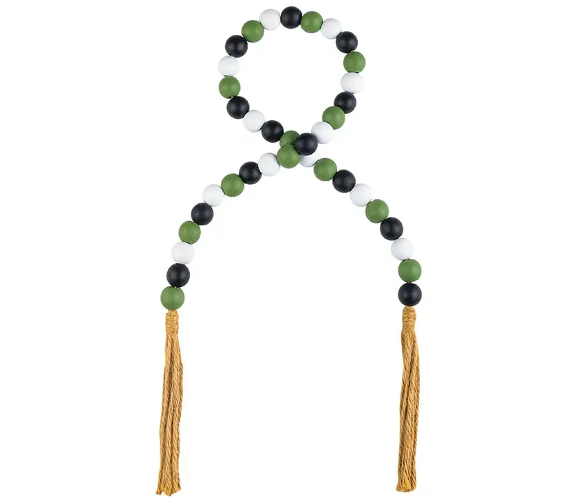 green and white beaded garland with long tassels
