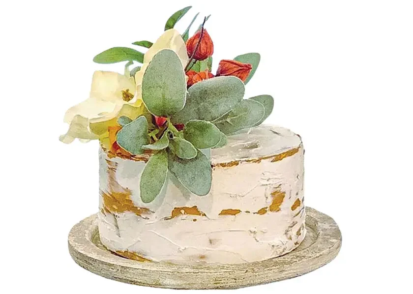 decorative faux cake with faux magnolia flower