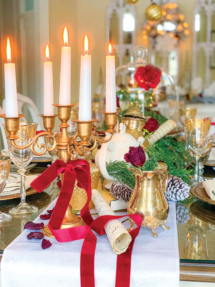 old world style candelabra with red ribbon on Christmas tablescape