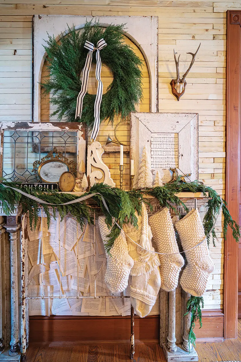 natural wreath and garland on mantel in cozy holiday home