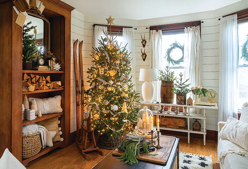 living room with neutral color palette and tapered candles and vintage skiis