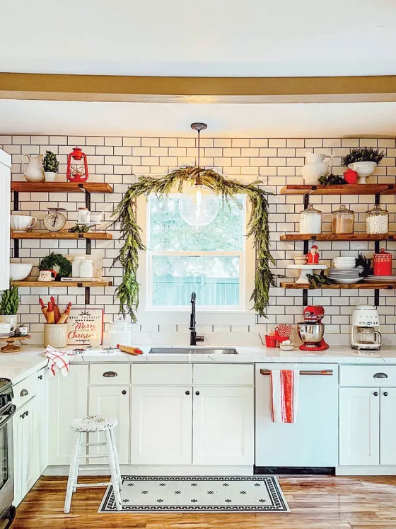 cozy Christmas kitchen with cedar garland over the window
