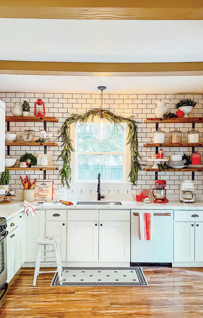 cozy Christmas kitchen with cedar garland over the window