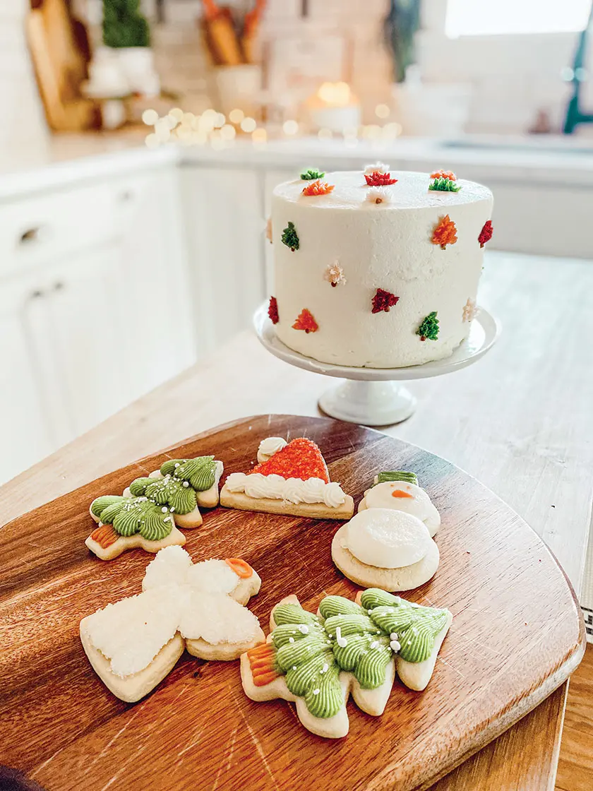 decorated cake and Christmas cookies