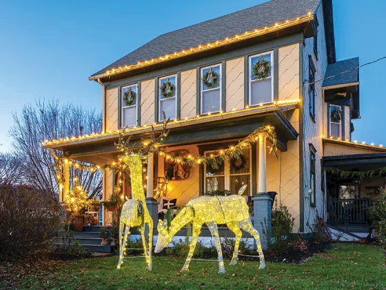 deer figurines and wreath in windows of historic Pennsylvania home