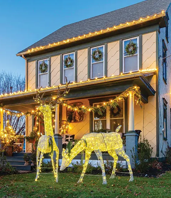 deer figurines and wreath in windows of historic Pennsylvania home