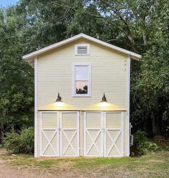 yellow and white siding on exterior of Fuller House Upper Room