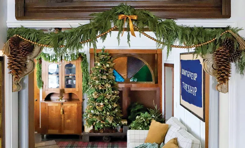 stained glass hides TV in historic Christmas house