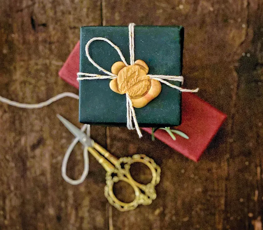 wax seal on top of Christmas present