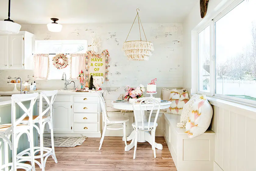 Christmas kitchen with white wreath and holiday coffee bar