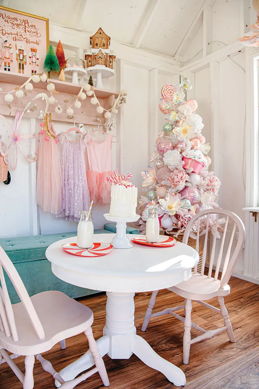 Christmas whimsy in play area with pink artificial tree