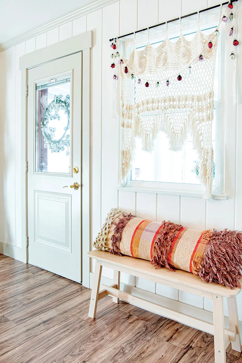 entryway in Utah home decorated with Christmas whimsy