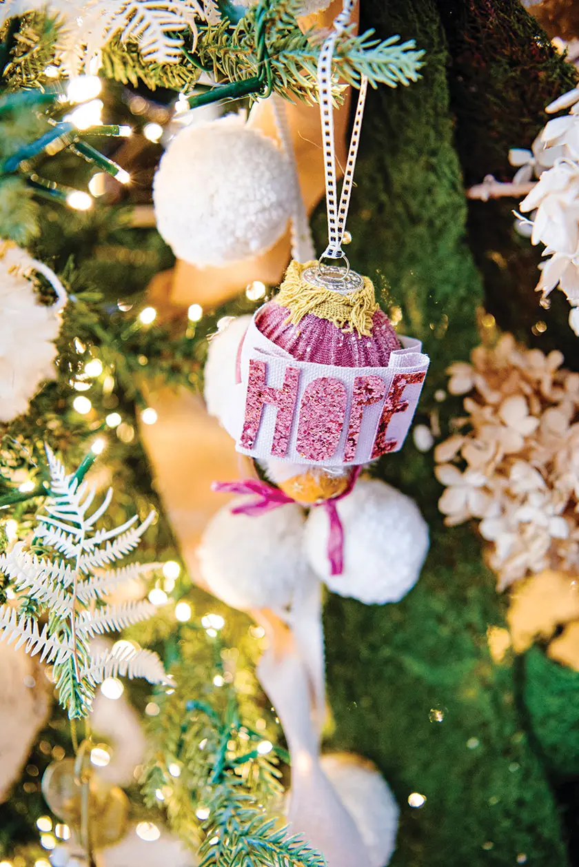 Christmas ornament on tree with soft neutral palette