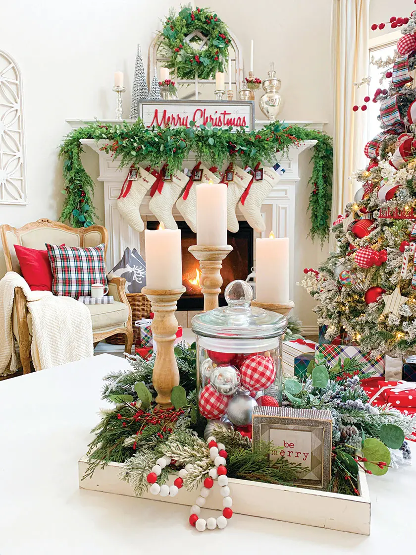 fireplace with wreath and garland and white stockings