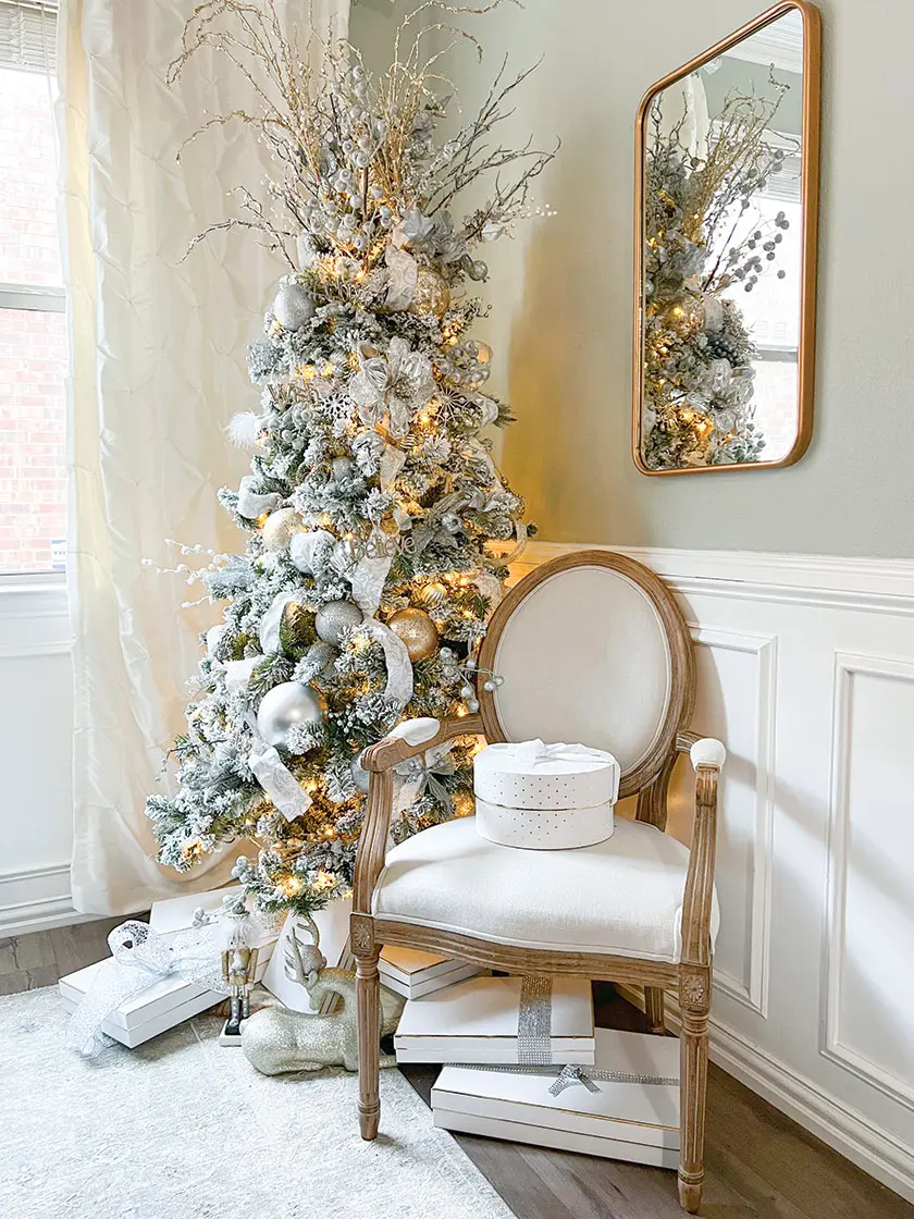 metallic rustic Christmas tree in corner of magical holiday home