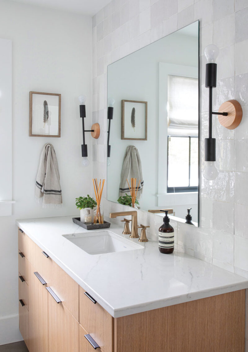 black modern wall sconces in Newport Beach bathroom