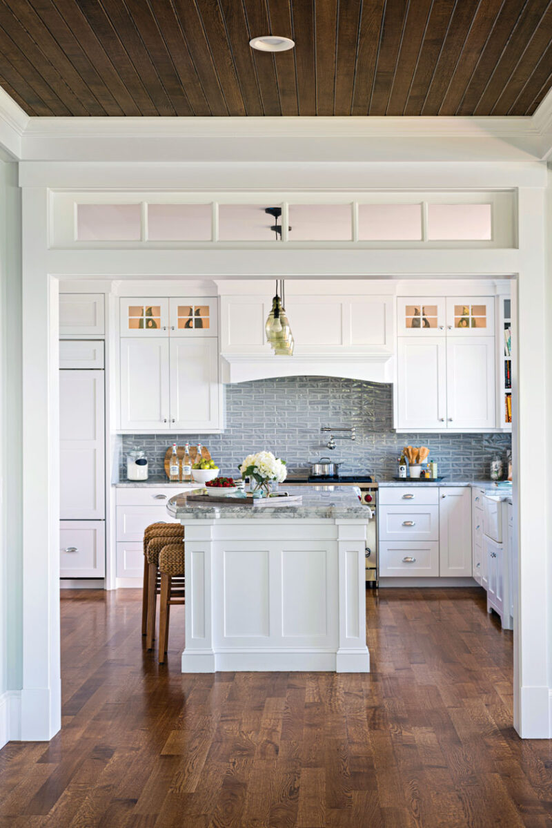 Cape Cod cottage kitchen with blue backsplash tile